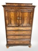 An early 20th century continental drink's cabinet fitted drawers beneath,
