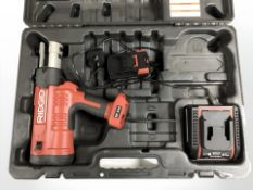 A Ridgid RP340 press tool, with Strutslayr strut shearhead, charger, instructions, etc.