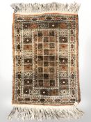 A Balouch rug, Afghanistan, 81 cm x 50 cm.