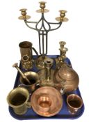 A group of brass candlesticks, two mortars, copper wares, etc.