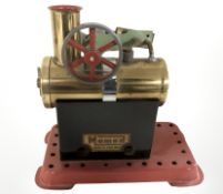 A Mamod live steam engine on plinth, length 14 cm.