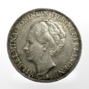 A 1930 2½ Guilder .720 silver coin CONDITION REPORT: 24.