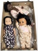 Three vintage dolls.