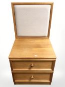 A G Plan two drawer bed side stand with upholstered back, 50 cm wide.