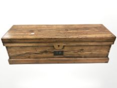 An early 20th century pine joiners toolbox containing carpentry tools.
