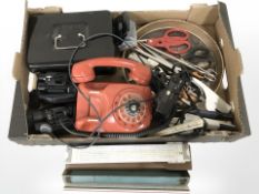 A group of binoculars, vintage telephone hand set, cash tin, rules,