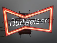 A Budweiser neon sign,
