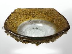 A 20th century textured amber glass bowl,