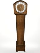 A 1920's oak grandmother clock,