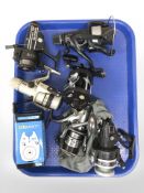 A group of fishing reels comprising of Shimano Baitunner Aero 6000RE, Abu Cardinal 155,