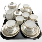 An Elizabethan Swiss Cottage twenty one piece tea set
