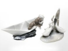 A Lladro figure of a puppy in a boat,