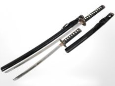 A replica Japanese Katana and matching Wakizashi