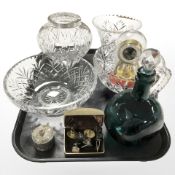 A group of crystal bowls, clock under dome, etched glass decanter with stopper,