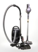A Bush stick vacuum cleaner plus a Meile cylinder vac
