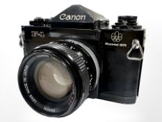 A Canon F-1 Montreal 1976 Edition 35mm camera with Canon FD 50mm 1:1.4 S.S.C. lens.