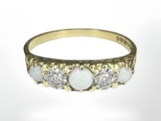 An 18ct gold opal and diamond ring, size S½ CONDITION REPORT: 3.