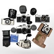 A collection of 35mm SLR and pocket cameras to include Hanimex Topcon RE Auto with UV Topcor 1:2.