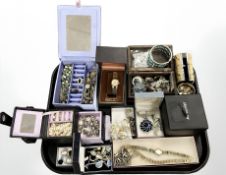 Assorted jewellery boxes containing costume pieces, bracelets, brooches,