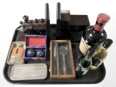 A pair of reproduction wooden bookends in the form of railway locomotives, Chinese medicine balls,