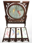 An Oriental hardwood and silk table screen depicting Koi fish,