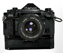 A Canon A-1 35mm camera, with Canon FD 50mm 1:1.
