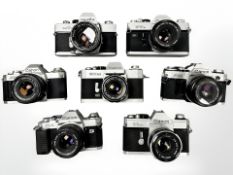 A quantity of SLR 35mm cameras including Minolta SRT 101 with MC Rokkor-PF 1:1.