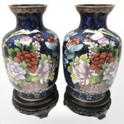 A pair of 20th century Japanese cloisonne enamel vases on turned stands,