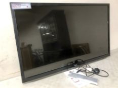 An LG 42 inc lcd tv with lead and remote