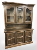 A reproduction oak dresser,