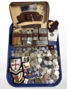 A quantity of British and foreign coins, embroidered cloth badges, pair of silver cufflinks,