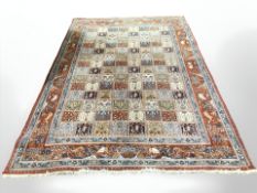 A Ghom carpet, Central Iran, 300 cm x 203 cm.