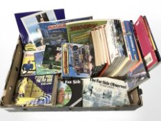 Assorted volumes including Steve Bell books, Snoopy, Gary Larson books.