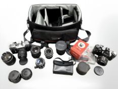 A collection of 35mm cameras, lenses and accessories to include Zenit EM with Helios -44-2 2/5.