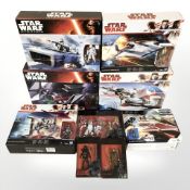 A group of Hasbro Disney Star Wars models and figurines.