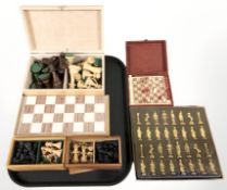 Three modern turned box wood chess sets, further die cast metal set,