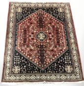 A Kashgai rug, 222 cm x 152 cm.