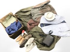 Assorted outdoor clothing, pairs of shoes,