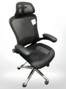 A contemporary swivel armchair