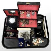 Assorted jewellery boxes containing costume pieces, bracelets, brooches,
