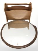 A teak magazine rack and a mirror, width 50 cm.