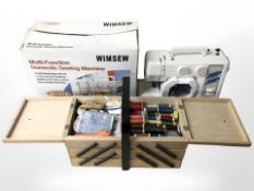 A Wimsew electric sewing machine in box and a concertina sewing box and contents