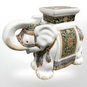 A ceramic elephant plant stand, height 43 cm.