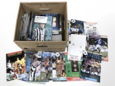 A large quantity of match day programmes, various including Newcastle United in binders,