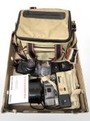 A Chinon camera bag containing CA-4 camera, Kodak Brownie 127, Miranda camera,