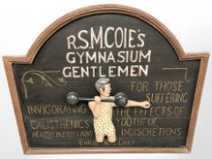 A reproduction Cole's Gymnasium painted wooden sign,
