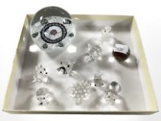 A Caithness glass paperweight and a group of Swarovski crystal miniature animal ornaments