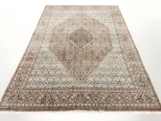 A Tabriz carpet, 250 cm x 355 cm.