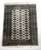 A Lahore Bokhara rug, Pakistan, 199 cm x 128 cm.