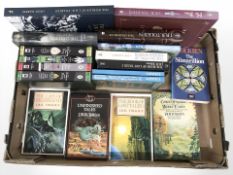 A collection J R R Tolkien volumes.